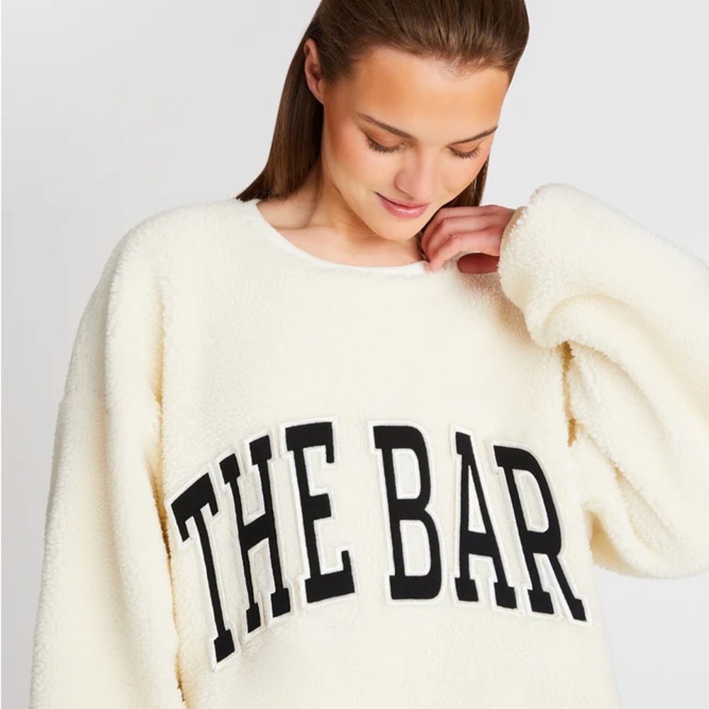 The Bar Cream Crewneck Sweater with Black Lettering